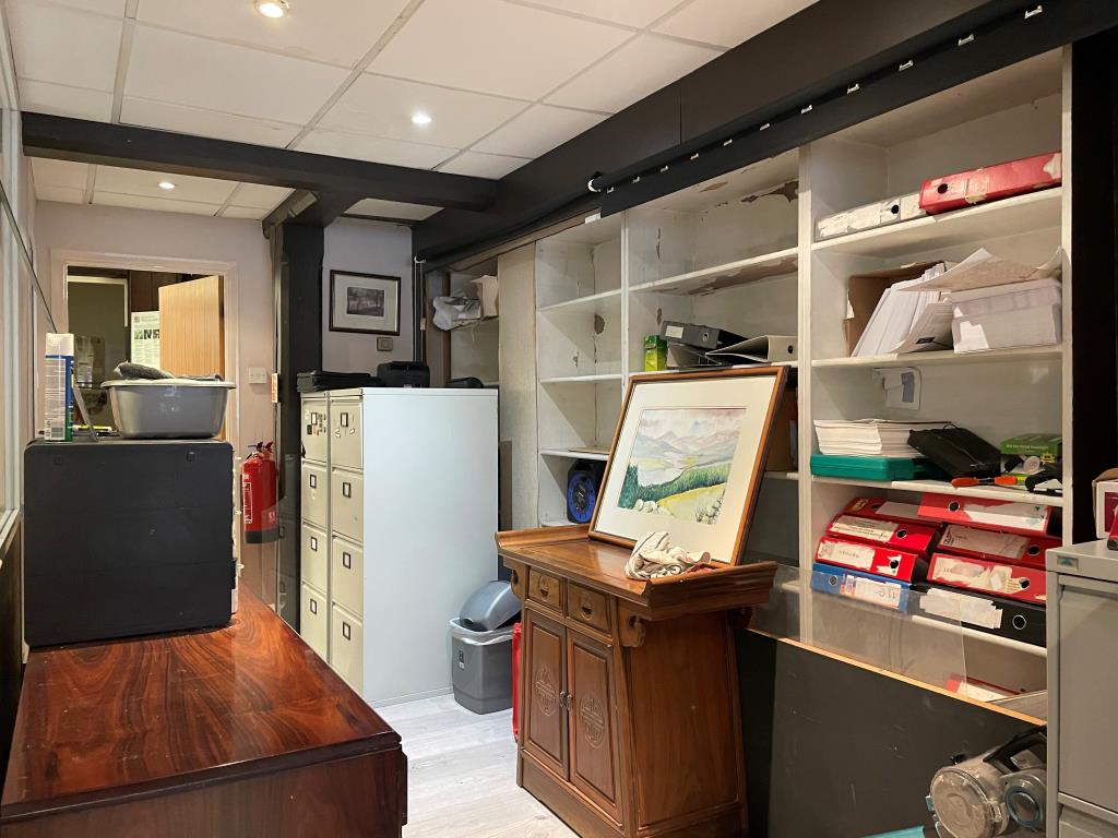 Lot: 79 - FREEHOLD SHOP AND FLAT WITH UPPER PARTS - rear storage area between offices